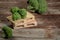 Green broccoli on wood table. rustic style, old wooden background. Organic food