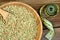 Green buckwheat in a bamboo bowl and centimeter