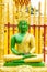 Green Buddha image on sitting position