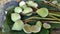 Green budding lotus flowers on leaves