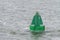 Green buoy as a marker for shipping