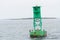 Green Buoy in a shipping lane