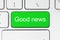 Green button with good news words on the keyboard