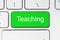 Green button with teaching word on the keyboard