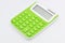 Green calculator white background.