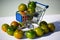 Green camone tomatoes in shopping cart