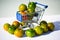 Green camone tomatoes in shopping cart