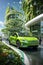 Green car parked in front of a modern building in a green city, a symbol of the future of sustainable transportation