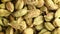 Green cardamom seeds background