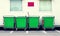 Green cart stands on a staff parking