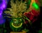 Green carved pumpkin figure, halloween, colorful light painted background, green halloween jack o lanterns, halloween