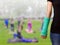 Green cast on hand and arm on blurred background woman fitness g