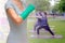 Green cast on hand and arm on blurred background woman fitness g