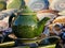 Green ceramic teapot in Bukhara marketplace, Uzbekistan