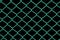 Green chain link fence with black background