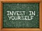 Green Chalkboard with Hand Drawn Invest in Yourself.