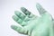 Green chemical gloves in a white background