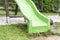 Green child slide on playground