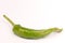 Green chilli pepper over white background