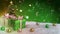 Green christmas theme with gifts, snow and bokeh background. Seamless loop. 3D render.
