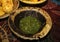 Green chutney,coriander mint crush for chaat served in disposable plate