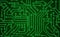 Green circuit board pattern texture. High-tech background in dig