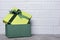 Green classic gift box with satin bow