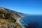 Green cliffs meet the Pacific Ocean in California, USA