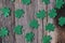 Green Clovers or Shamrocks on Rustic Wood