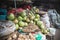 Green coconuts for sale at Ba Market in Hue, Vietnam