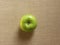 Green color ripe Granny Smith apple isolated