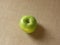 Green color ripe whole Granny Smith apple isolated