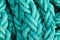 Green color texture, close-up photography of nautical ropes