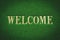 Green colored welcome doormat