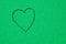 Green colorful heart in clean sparkling background. Love or romance in the color green.