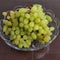 Green Coloured grapes kept in a dish. Botanically grapes are berries full of nutrients and antioxidants