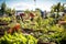 Green community garden champions sustainable practices, composting to shrink waste footprint.