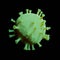 Green coronavirus on empty black background.