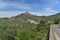 Green Corsican mountain with a small village Pigna