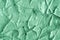 Green cosmetic clay texture close up