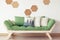 Green couch and cork decor