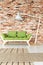 Green couch in industrial interior