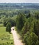 Green countryside with road, meadows