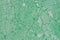 Green creased watercolor painted paper background texture