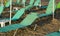 The green deckchairs open waiting for tourists