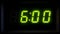 A Green Digital 12-Hour Clock on an Infinite Loop 4K Timelapse