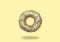 Green donut on on pastel yellow background