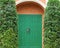 Green door with classic door handle lock