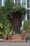 Green Door Of Fairytale Cottage With small garden. Europe