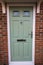 Green door. Modern house composite UPVC front door